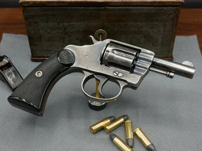 Rare Colt New Police 32 S&W 2,5 pouces de 1904 dans son coffret exceptionnel.