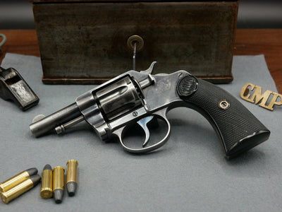 Rare Colt New Police 32 S&W 2,5 pouces de 1904 dans son coffret exceptionnel.